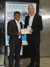PosterPrizeEUROCORR2014ArjanPreisträger Überreichung